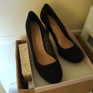 Ladies size 11W boots and heels.